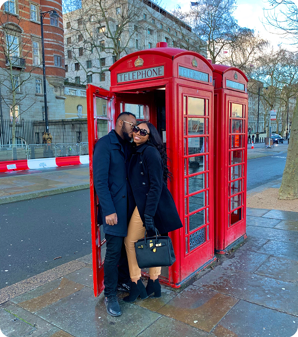 BM and Arlette outside a London telephone box